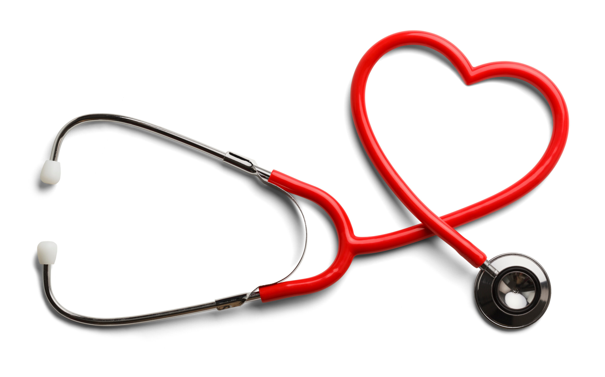 A red stethoscope lies on a white surface in the shape of a heart