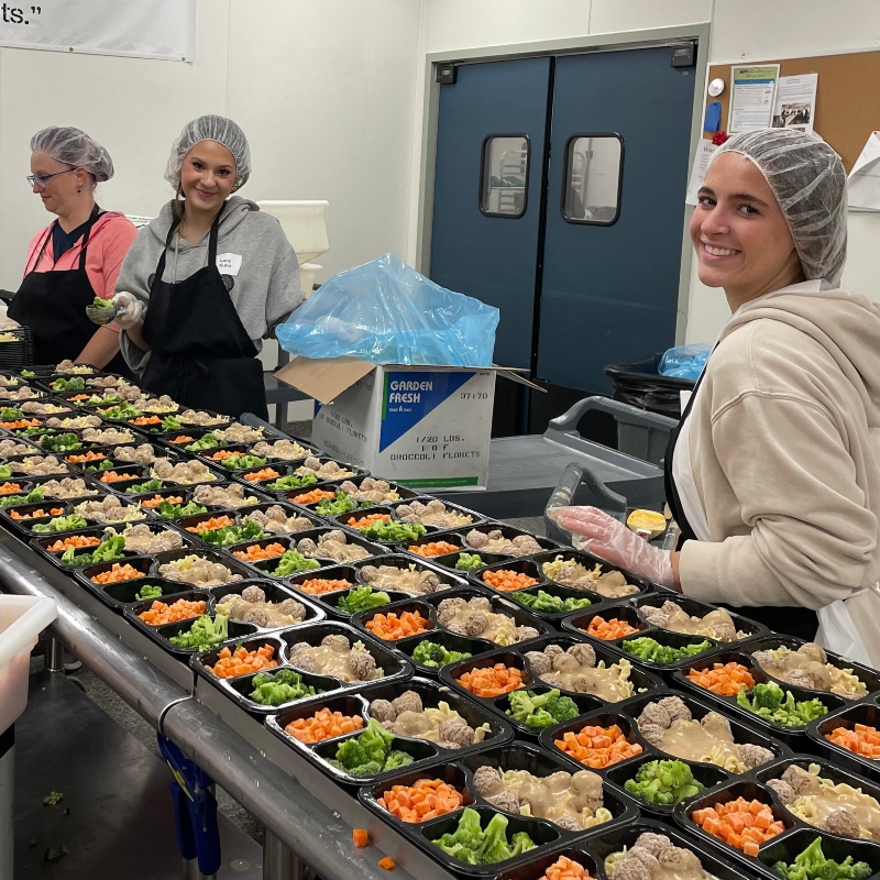 MOWWM volunteers and team members prepare Home Delivered Meals for the seniors they serve.