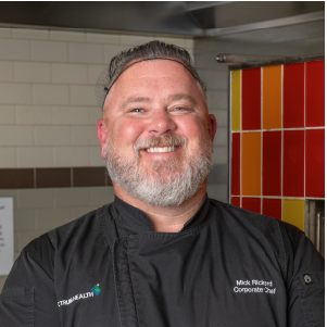 Chef Mike Rickerd smiling for the camera.